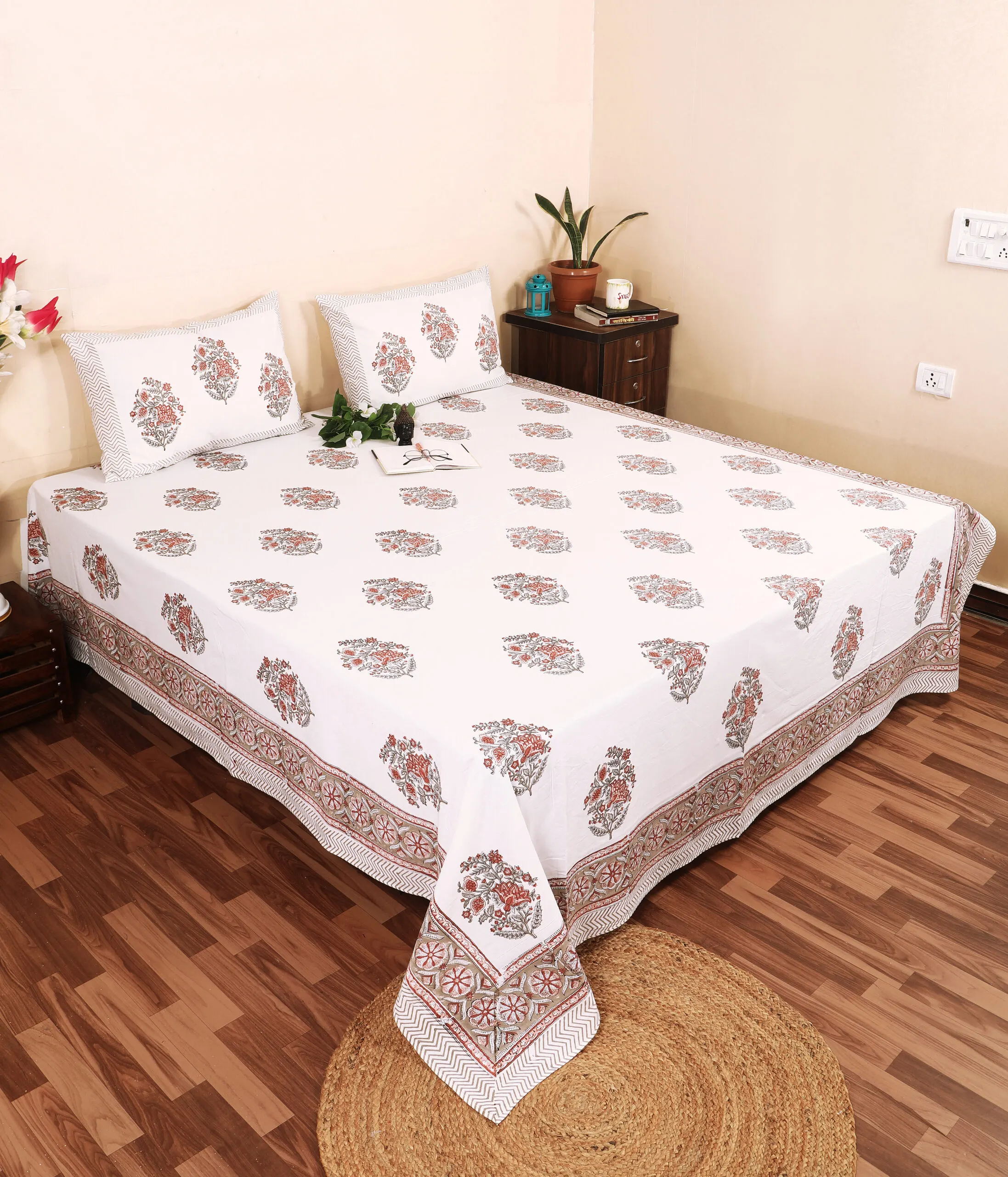 Block printed cotton double bedsheet on bed